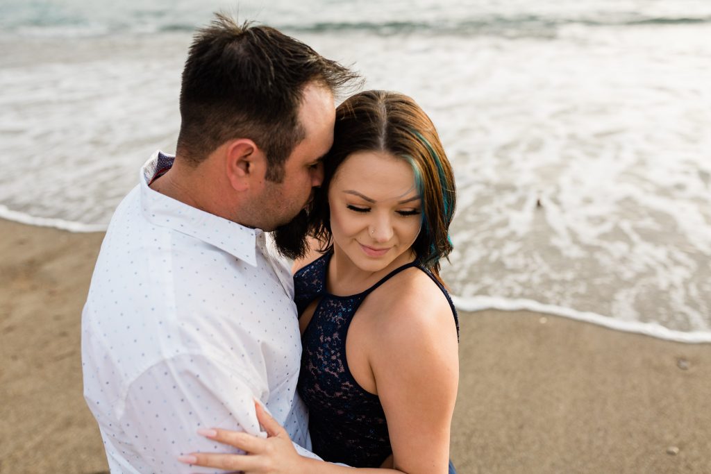 engagement photos with the ocean in the background