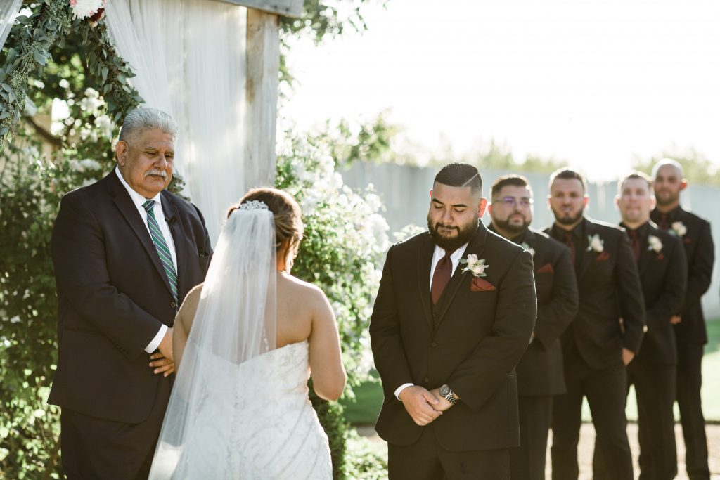 groom getting emotional during wedding ceremony