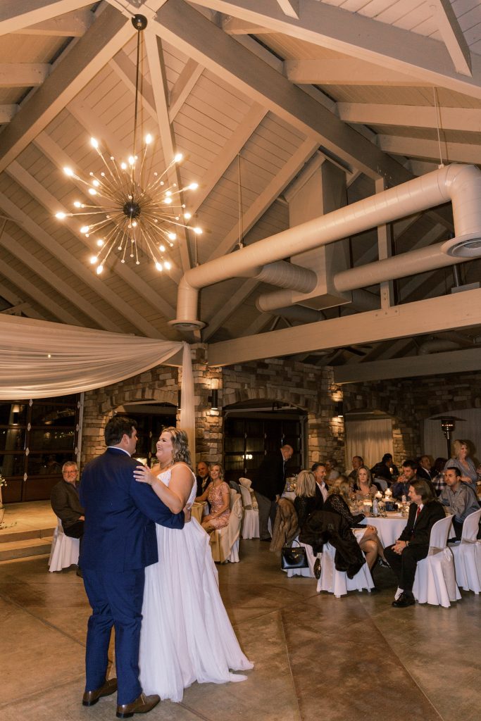 Couples first dance under the lights at Wolf Lakes Park