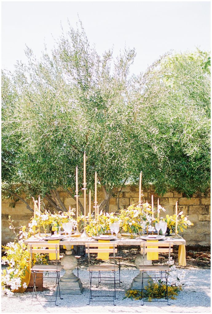 yellow wedding table decor shot on portra 800 film scanned on frontier by photovision prints