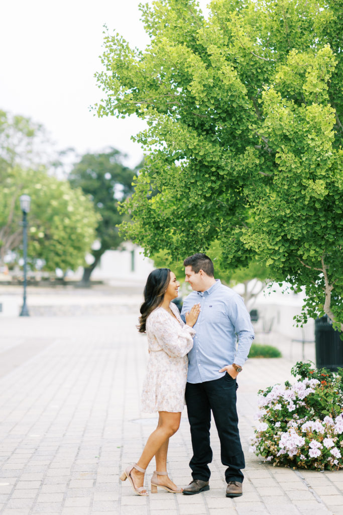 couple posing along a walkway in Monterey California by Fresno Wedding Photographer Megan Helm Photography