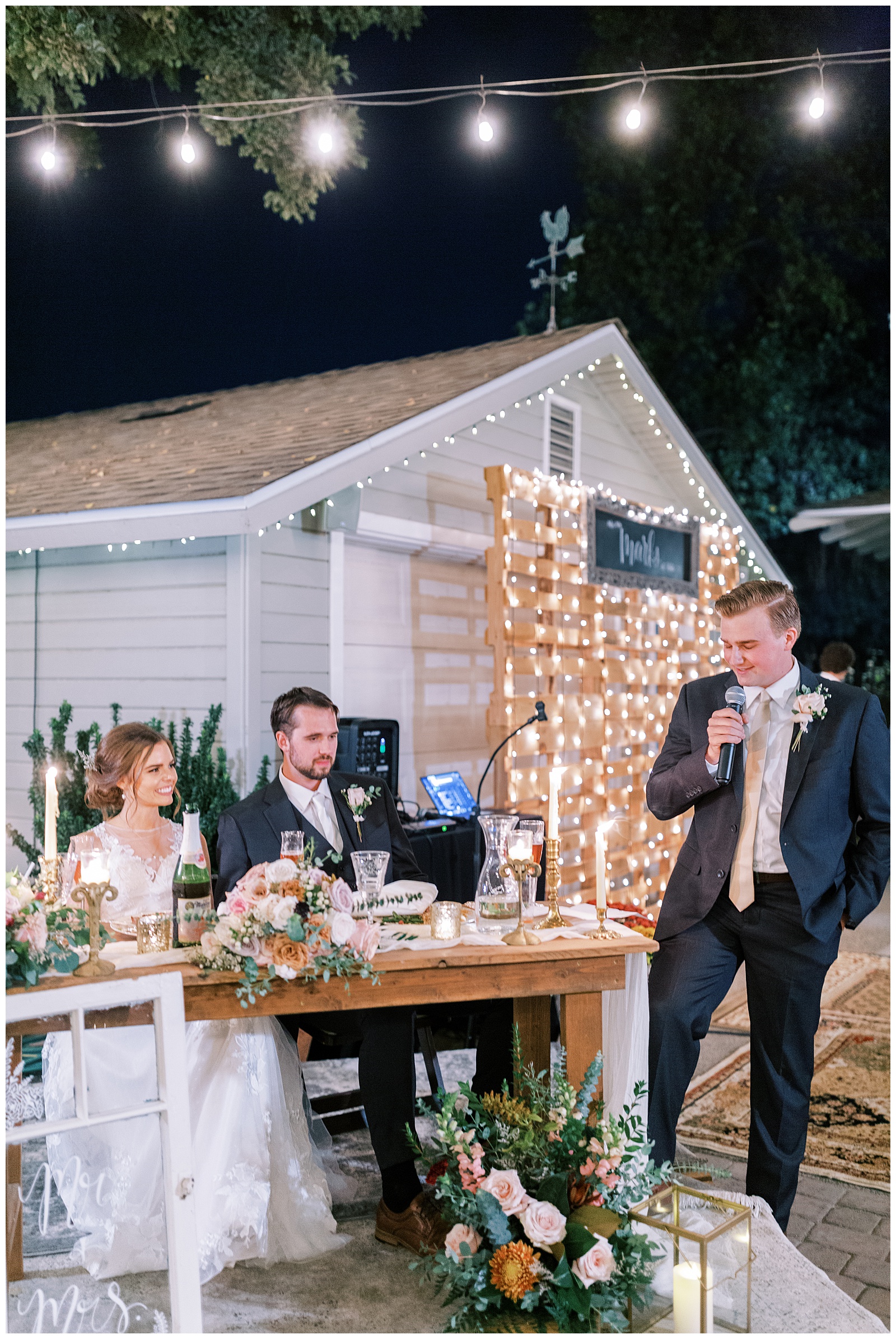 bride and groom listening to best man toast backyard wedding