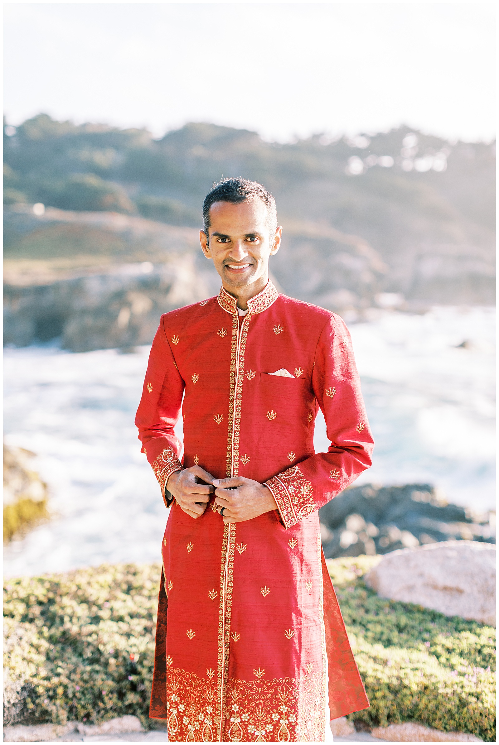 groom in traditional red indian wedding attire
