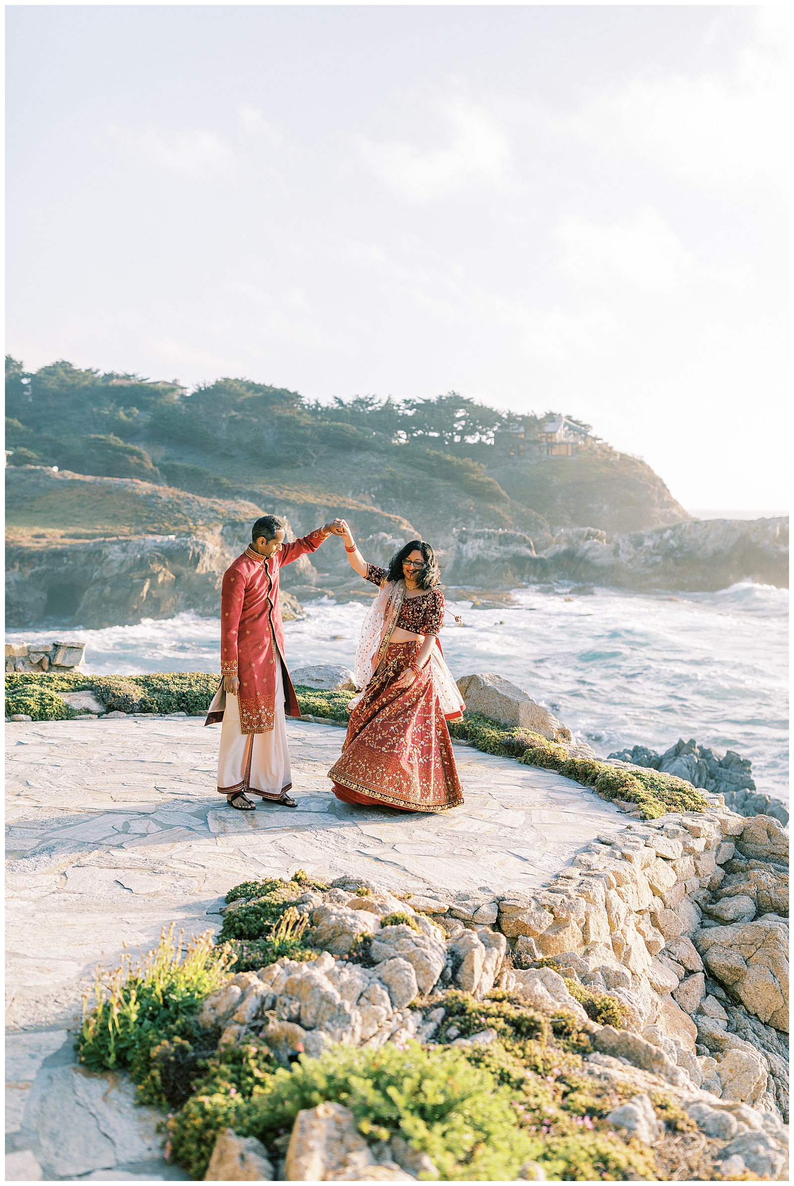 bride and groom dancing along cliffside in carmel-by-the-sea california wedding photographer megan helm photography