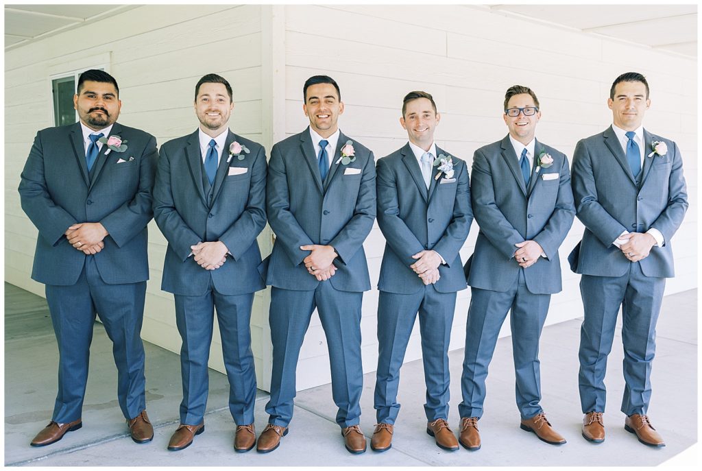 groom and groomsmen grey tuxedos