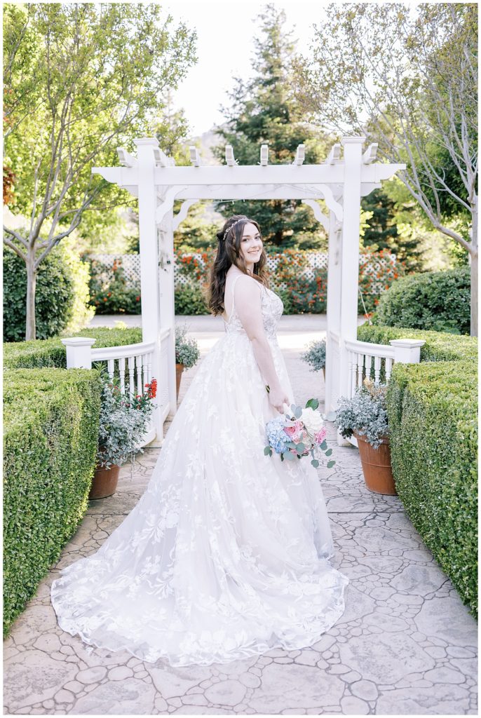 bride in lace overlay wedding dress