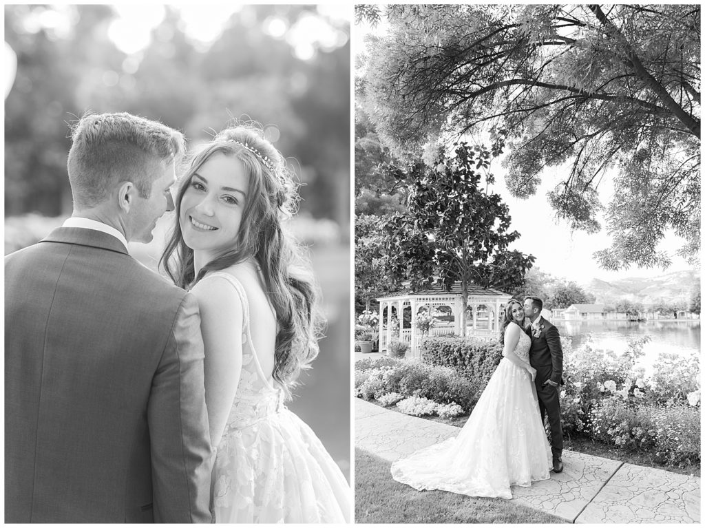 black and white images bride and groom kissing by a lake