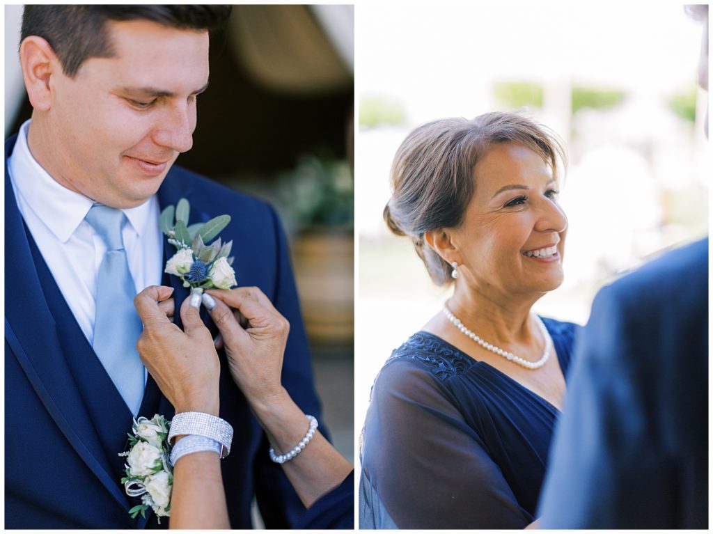 mother of groom pinning boutonnière on grooms suit coat