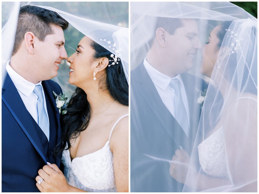 bride and groom under bridal veil